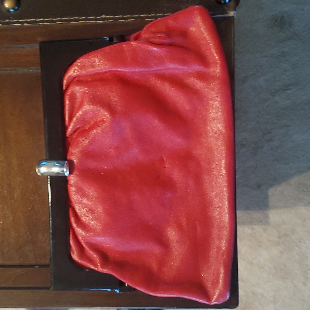 Vintage mantessc BoHo red leather with black handle purse made in Italy.